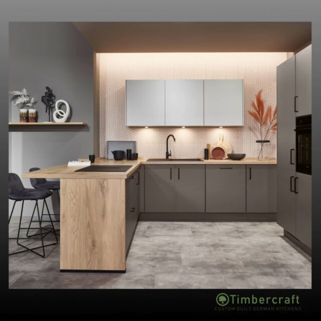 Satin Grey wall units create a light, refined backdrop, while Taupe Grey doors ground the main kitchen with understated depth. Black bar handles introduce a crisp, modern edge, perfectly contrasted by the warmth of the Sierra Oak reproduction laminate worktop.

A space where subtle contrasts come together to create something quietly striking, designed to feel as good as it looks.

🌱 Let your German dream kitchen come to life with Timbercraft custom-built German designs!

💡 Ready to elevate your space? Visit us at timbercraft.ie.

#germankitchen #modernkitchen #homedesign #kitchendesign #bespokekitchen