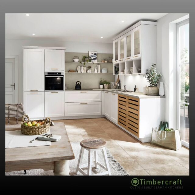Light-filled. Layered. Effortlessly refined.

This timeless Shaker kitchen pairs crisp white cabinetry with honed white wood handles, creating a soft, natural elegance that never dates. Warm wood accents, open shelving and glass-front details bring character and calm, while the layout is designed to work beautifully for real life.


🌱 Let your German dream kitchen come to life with Timbercraft custom-built German designs!

💡 Ready to elevate your space? Visit us at timbercraft.ie.

#germankitchen #modernkitchen #homedesign #kitchendesign #bespokekitchen