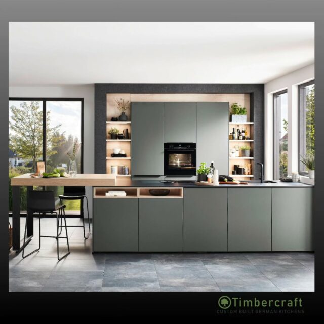 Designed to feel effortless

Mineral Green cabinetry brings depth and warmth, paired with crisp black bar handles on the units for a bold, architectural contrast. Around the rear of the peninsula, push-to-open doors keep everything streamlined, letting the space breathe without visual noise.

A kitchen where form, function and feeling align, crafted to be lived in beautifully, every single day.


🌱 Let your German dream kitchen come to life with Timbercraft custom-built German designs!

💡 Ready to elevate your space? Visit us at timbercraft.ie.

#germankitchen #modernkitchen #homedesign #kitchendesign #bespokekitchen