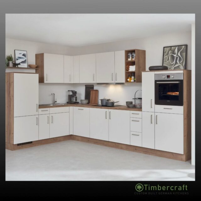 Simple tones. Strong impact.

Crisp white doors keep the space feeling bright and timeless, perfectly framed by Havana Oak reproduction across the laminate worktop, plinth, and side gables, bringing warmth and natural character throughout. 

Stainless steel finish metal handles add a subtle, modern touch, completing the look with clean precision.

A kitchen that proves simplicity, when done right, speaks volumes

🌱 Let your German dream kitchen come to life with Timbercraft custom-built German designs!

💡 Ready to elevate your space? Visit us at timbercraft.ie.

#germankitchen #modernkitchen #homedesign #kitchendesign #bespokekitchen