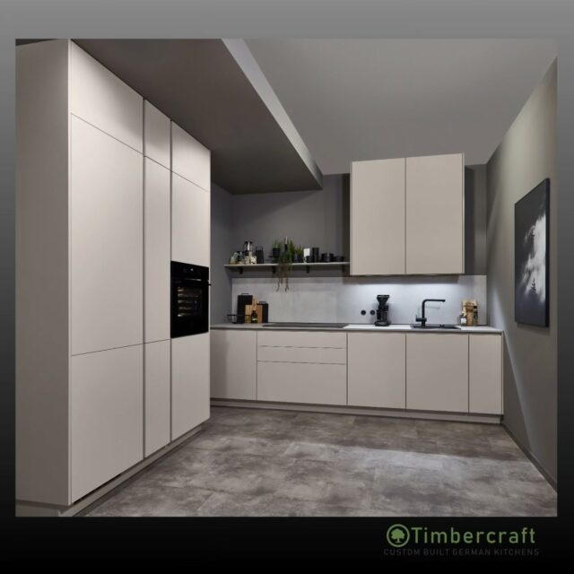 This beautifully streamlined kitchen showcases Lacquer, premium honed white, delivering a soft, refined finish that brightens the entire space with understated elegance.

The white recessed handle keeps the look clean and architectural, maintaining seamless lines while offering practical everyday comfort.

Completing the design is the slimline laminate worktop in White Concrete reproduction, adding a subtle textured contrast that enhances the modern aesthetic without overwhelming the space.

🌱 Let your German dream kitchen come to life with Timbercraft custom-built German designs!

💡 Ready to elevate your space? Visit us at timbercraft.ie.

#germankitchen #modernkitchen #homedesign #kitchendesign #bespokekitchen