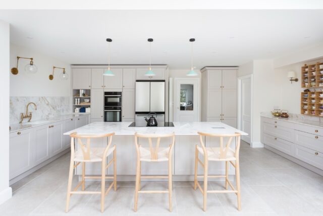 A timeless kitchen designed for a beautiful home in Killiney, Dublin. 

This bespoke Shaker-style kitchen pairs soft light grey cabinetry with the natural character of stone worktops and warm antique brass accents throughout.

At the heart of the space, a generous island creates the perfect place for casual dining, entertaining and everyday family life. On the adjacent wall, a bespoke oak china display unit adds warmth and contrast while providing a striking home for treasured pieces.

Thoughtful details. Natural materials. Crafted to belong in the home for years to come.

Planning a new kitchen or bespoke interior? Talk to Timbercraft about bringing your ideas to life. 📲📧

Visit our website to explore more of our work and start your project: www.timbercraft.ie 

#Timbercraft #BespokeKitchens #ShakerKitchen #KitchenDesign #IrishInteriors DublinInteriors Killiney BespokeJoinery KitchenInspiration InteriorDesignIreland CraftedInIreland