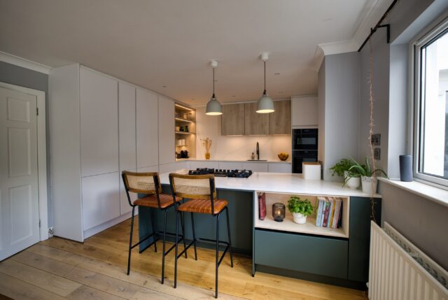 Clean lines, natural textures and effortless functionality—everything we love about Scandinavian-inspired kitchen design.

This recent @timbercraftireland project showcases a contemporary handleless kitchen where simplicity meets warmth. The contrasting green peninsula creates a striking focal point, complete with breakfast bar seating that encourages everything from morning coffees to evening conversations. An open shelving feature unit adds character and display space, bringing personality to the clean, minimalist aesthetic.

Designed to maximise both style and practicality, this kitchen proves that great design doesn’t have to shout to make an impact.

Thinking about creating your own contemporary kitchen? Visit our Newbridge or Dún Laoghaire showrooms and let our team help bring your vision to life. 📲☎️📞📧

Book your design appointment today.

#TimbercraftKitchens #GermanKitchens #ScandinavianDesign #HandlelessKitchen #KitchenInspiration